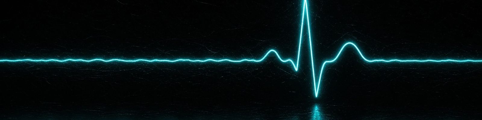 An ECG trace in cyan light